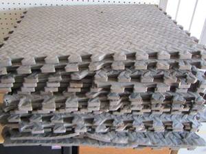 lot 64 image: Large grey foam matt used for garage flooring