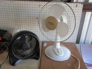 lot 67 image: 2 small bed side fans  brands are Atlantic & Honeywell