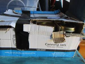 lot 92 image: box of canning jars new with lids