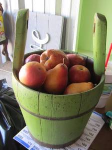 lot 155 image: Wooden bucket with wax fruit, handle is broken