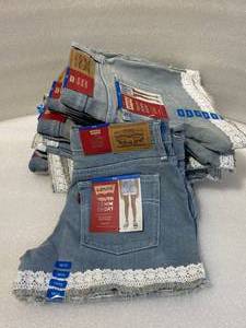 lot 16 image: Lot of 10 - New WTags Levis Girls Youth Denim Girlfriend Short Pants Light BlueWhite Knitted Lower Design WAdjustable Waistband & Stretch - Size 1012 - As Shown - Retails $420