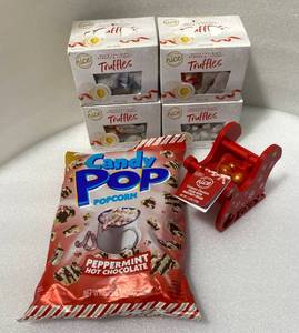 lot 20 image: Lot of 6 - New Nice White Chocolate Almond & Coconut Truffles, New European Chocolate Filled With Hazelnut Cream New Candy Pop Popcorn Peppermint Hot Chocolate - As Shown