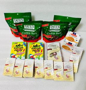 lot 55 image: Lot of 17 - New Tates Bake Shop Cookie Bark, Sour Patch Kids Christmas Book, Daelmans Stroopwafels & Lindt Lindor Truffels - As Shown