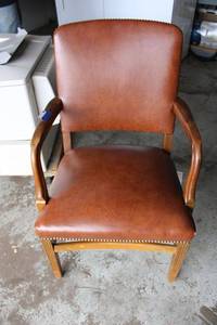 lot 5 image: Brown Vinyl upholstered armchair with button trim
