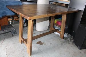 lot 25 image: Tall Dining table with natural distressed wood look. 59x35