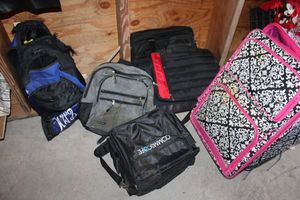 lot 43 image: Suitcase, computer bags and backpacks