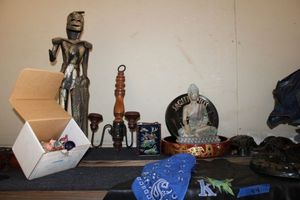 lot 44 image: Misc. housewares - hanging ceramic owls, Buddha statue, aluminum suit of armor statue, mini figurines and more