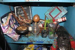 lot 50 image: Hosewares Tribal face wall hanging, glass vases, basket, maraca and more