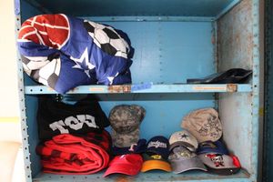 lot 64 image: Twin size Blankets and ballcaps