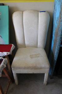 lot 72 image: Upholstered armless chair as shown