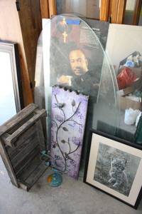 lot 76 image: Wall art, metal bird candle holder, wood step, oval glasstop, Martin Luther King Jr. poster and mirror piece