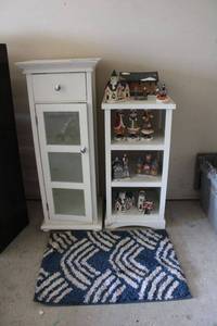 lot 94 image: Narrow white cabinets with Christmas figurines and rug