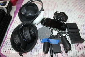 lot 114 image: Headphones, No Face facial toning device, Nintendo Switch Joy-Con grip, Sony PSP and more
