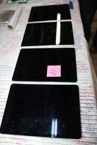 lot 126 image: (4) Apple iPads as is (2 powered on)
