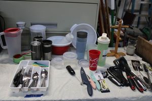 lot 144 image: Kitchen silverware tray, utensils, plastic pitchers and bowls, wooden coffee mug holder