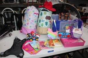 lot 150 image: Kids toys, craft supplies, sleeping bags and car window shade
