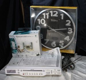 lot 19 image: GPX Under counter mounted DVD, cd player, with AMFM Radio and television sound