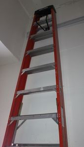 lot 20 image: Twelve (12) Foot Ladder with Bracket (Buyer must Remove)