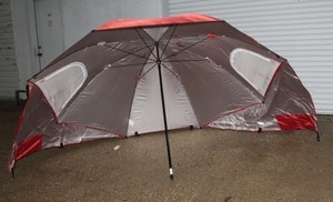 lot 14 image: The Beach Umbrella, 9ft wide, with a telescopic pole and zips open to let the wind threw, perfect for trips to the lake, park and It is easy to set up.