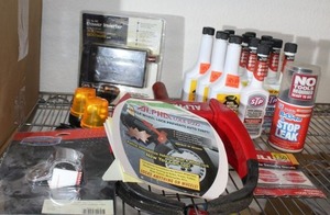 lot 74 image: Automotive items Stp Treatment, Flashing Yellow Lights, Stop Leak and more