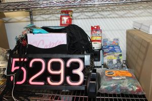 lot 82 image: Plastic Spinning Organizer and 4-250 Count Reems of CopyPrinter Paper and P-Touch PT700 Label maker with extra labels