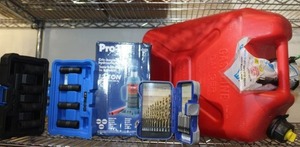 lot 83 image: Kobalt 10 pcs Impact Socket Set unused, Drill bits unused and screw driver bit set and Pro-lift 12 ton Bottle Jack unused, and 5 gallon gas can with spout