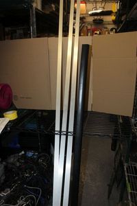 lot 94 image: 3 8ft Cubicle Trim and 5 ft wire covers