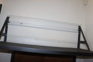 lot 97 image: Gladiator Gear Track Hook wall Shelf Buyer Must Remove from wall