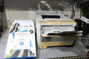 lot 135 image: HP Laser Jet P2055 Printer and 4 Reems copy printer paper