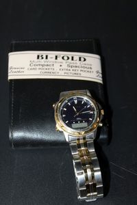 lot 232 image: Pulsar Watch and Mens Leather Bifold Leather Wallet, Watch appears to only needs a battery