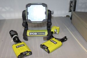 lot 239 image: Ryobi Hybrid Light and two Power Chargers, Battery or charger not included