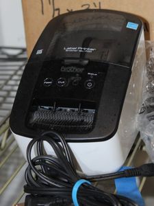 lot 105 image: Brother QL-700 Label Maker and labels