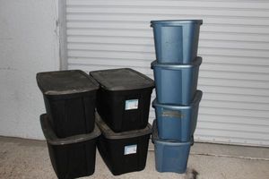 lot 184 image: Four 20 Gal. Totes with lids and Four 10 Gal. Smaller Totes with lids
