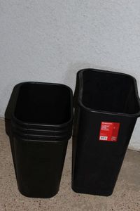 lot 186 image: Four Medium size Rubbermaid Trash Cans and one Larger Trash can