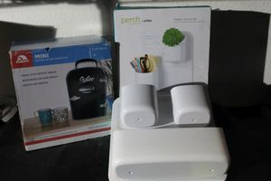 lot 192 image: Two Perch organizer sets and an Igloo electric coolerwarmer