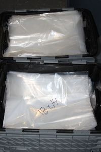 lot 279 image: Poly Bags 1 34 Totes Full 12x14 & 14x18