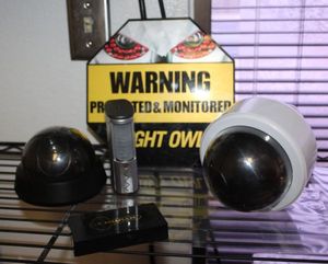 lot 9 image: Security Camera Look a Likes with LED light and more
