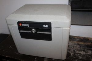 lot 22 image: Sentry 1170 Fire File Proof File Size Safe with Key