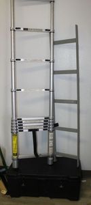 lot 27 image: 10.5 Foot Telescoping Ladder, 5ft Ladder and Heavy Duty Plastic Trunk