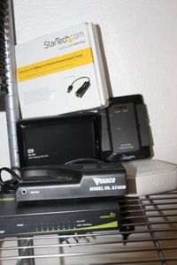 lot 49 image: Wi-Fi Extender, Switches, Router and more