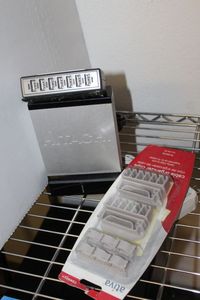 lot 55 image: Hitachi 2TB External Hard Drive USB Port and Cable Organizer