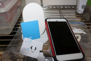lot 67 image: Google Pixel XL phone Factory Restored and Google Wireless Charger
