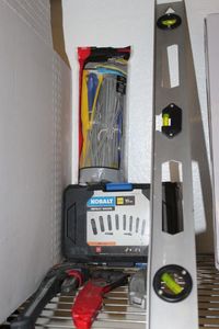 lot 69 image: Kobalt Impact Driver Sockets Factory Sealed Crescent Wrenches and Wire ties