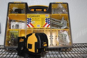 lot 83 image: Stanley Deep Professional Small Part Organizer and Laser Measure, Level and Cross Level, DeWalt Grease Pen
