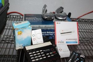 lot 107 image: APC Network Battery Back up, X10 Home Automation items, 2 wireless Video Receivers, and more