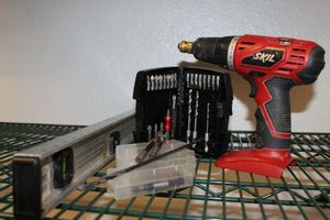 lot 118 image: Skill Drill Driver and Variety of Drill bits