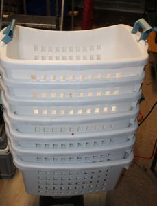 lot 146 image: Rubbermaid Stack and store White Laundry Baskets with Handles Quantity of Seven (7)
