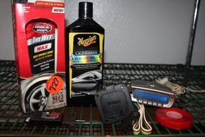 lot 152 image: XM Satalite Radio Receiver and other Automobile Items as Shown