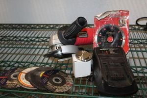 lot 173 image: AC Delco 4 Grinder with Charger No Battery and Extra Blades