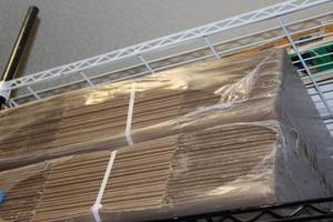 lot 290 image: Shipping Boxes 2 Bundles 20x14x10 Each bundle has approximately 20 boxes